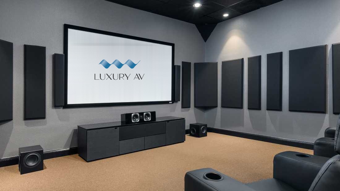 big screen displaying the av specialist logo on a home theater