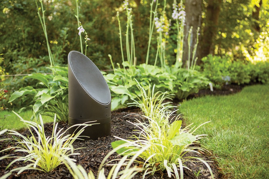 Coastal Source speakers blending into landscaping. 
